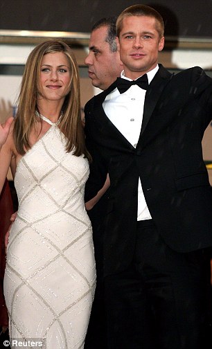 Present and past: Seen here with Justin in June in New York and, right, with Brad at the Cannes Film Festival in May 2004